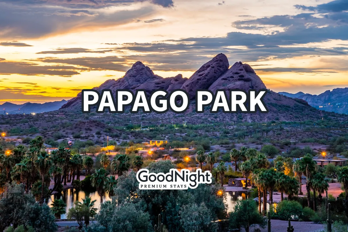 A breathtaking sunset backdrop frames the iconic Papago Park mountains, with palm trees silhouetted against a tranquil, colorful sky. The scene invites exploration, relaxation, and photography, perfectly capturing the spirit of local outdoor adventures.