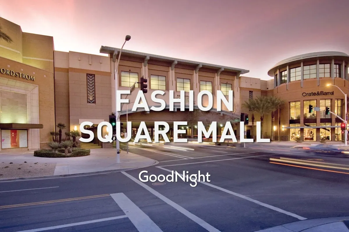 This image showcases the iconic Nordstrom entrance and the Crate & Barrel facade at Scottsdale Fashion Square, surrounded by palm trees and vibrant city life. The bustling street and modern architecture immediately evoke a sense of high-end shopping and urban energy.